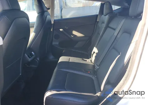 2023 Tesla Model Y z USA, uszkodzony, nr VIN 7SAYGDEF6PF646595